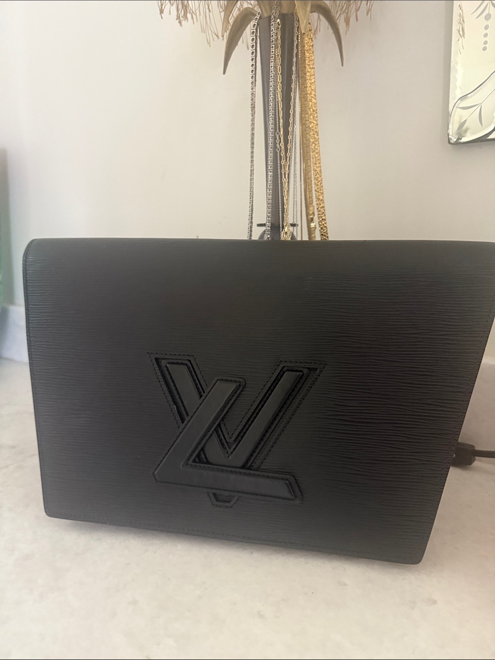 Louis Vuitton Black Embossed LV clutch